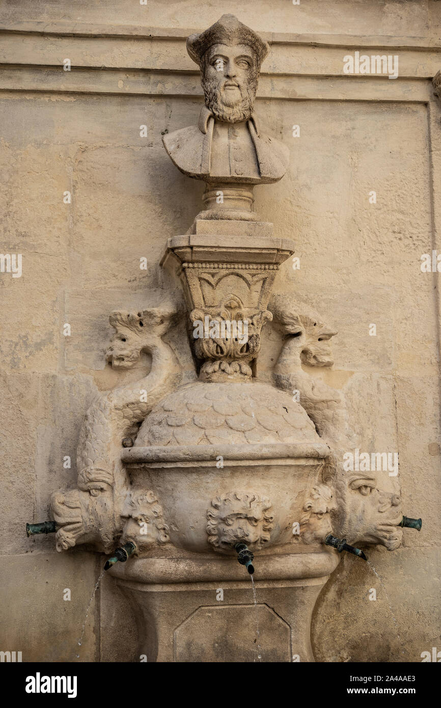 Nostradamus stone fountain sculpture found in San Remy, Provence, France. Stock Photo