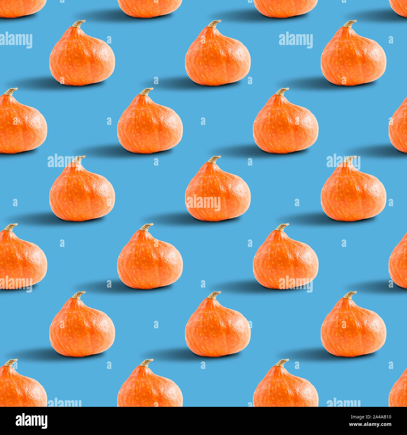 seamless pattern of pumpkins on a blue background, concept of healthy ...