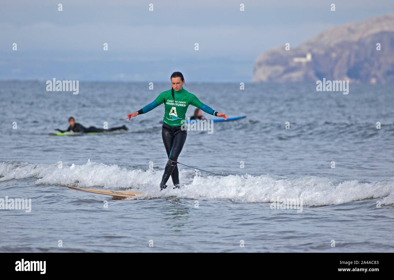 Belhaven Beach, East Lothian, Scotland, UK. 13th October 2019. Tens of Adults and youngsters took part in the Lowland Longboard Surfing Contest, pictured some of the contestants taking part in the semi-finals of what is an annual event, this year held in Dunbar. True to the Longboarding style this event has a beautiful mellow feel to it, chilling out on Belhaven Beach watching some incredibly talented surfers.  Kids had  the opportunity to compete on three crafts! The U16yr Bodyboard and U18yr Longboard are qualifying events for the Scottish National Team. Stock Photo