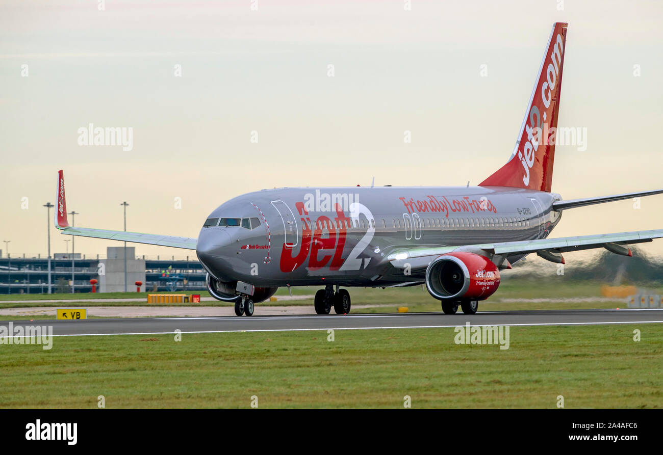 Jet2 Boeing 737-800,  G-JZHO ' Bob Gruszka' taxying for take off  at Manchester Airport Stock Photo