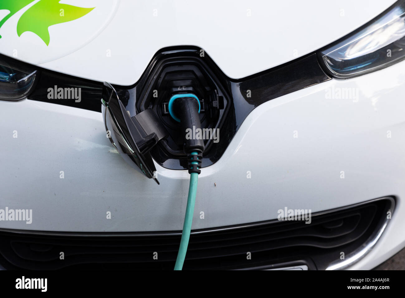 An electric car being charged at an EV charging point Stock Photo Alamy