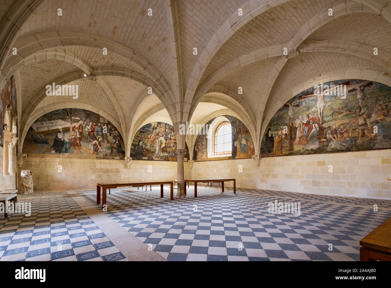 Refectory at Abbey of Fontevraud, Loire, France. Restored refectory or dining room, with beautiful fresco on each wall Stock Photo
