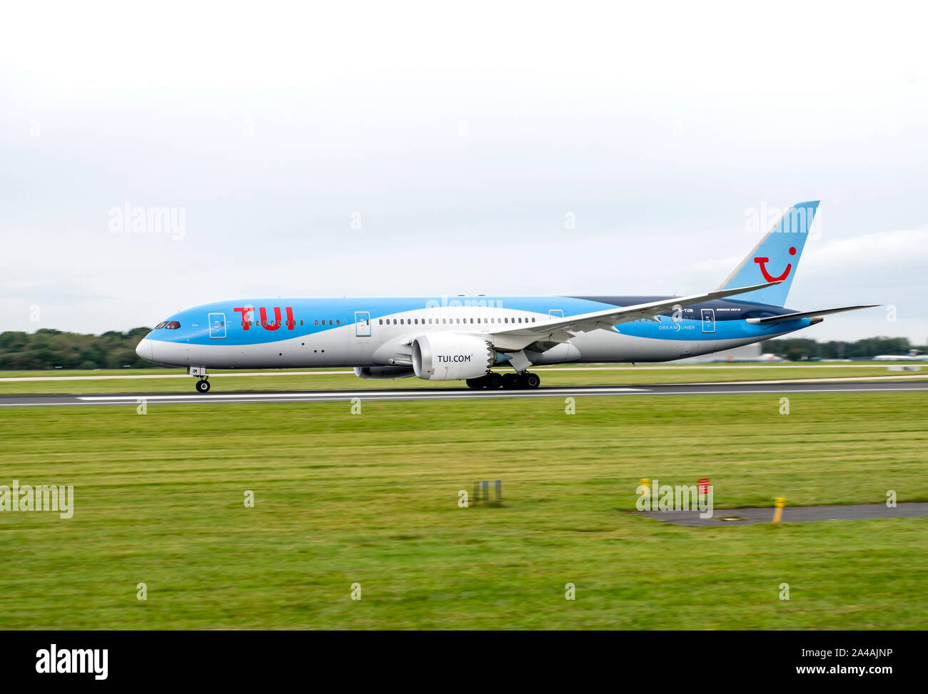 TUI, Boeing 787-9 Dreamliner, G-TUIM, rolling for take off at Manchester Airport, Stock Photo