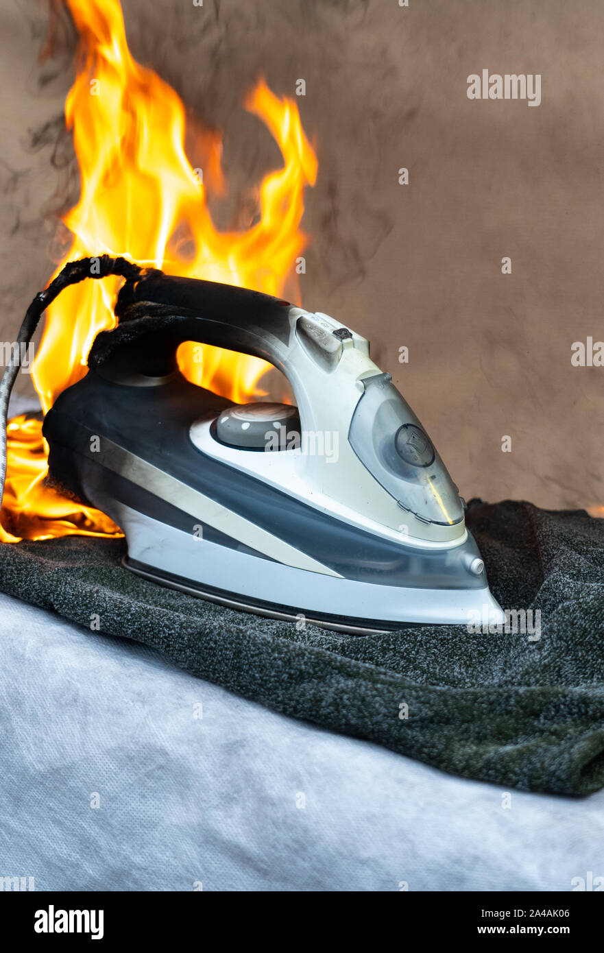 They to turn off the electric iron for ironing clothes. Careless