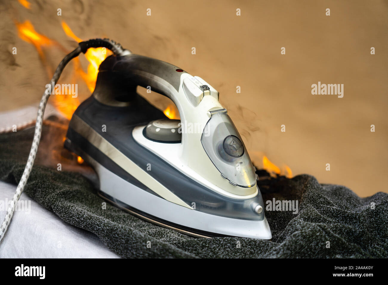 They to turn off the electric iron for ironing clothes. Careless