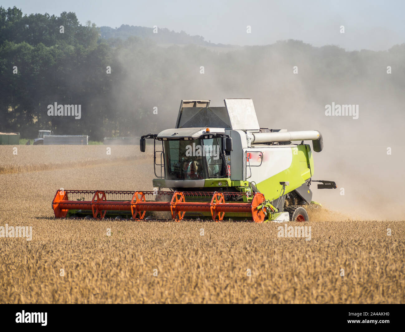 Combine harvester in the field Stock Photo - Alamy