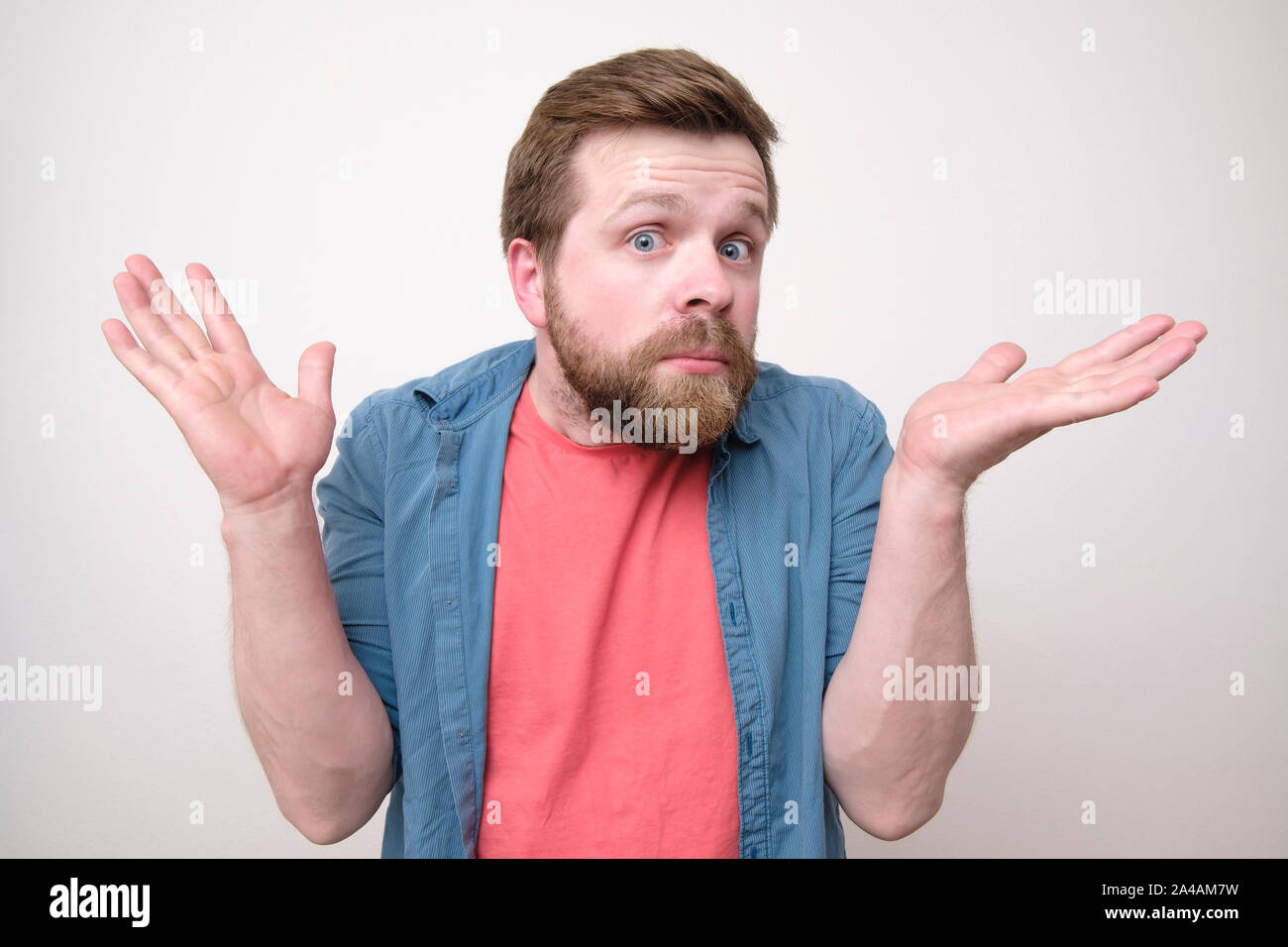 Amazed confused bearded young hi-res stock photography and images - Alamy