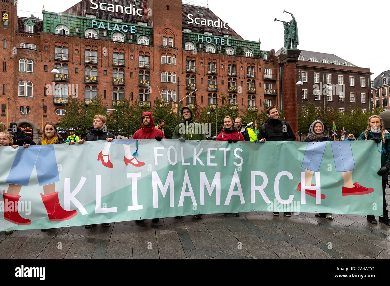 COPENHAGEN, DENMARK – OCTOBER 11, 2019:  Thousands of people gather at a People’s Climate March at Copenhagen City Hall Square and demanded swift and extensive climate action, which marks the conclusion of the C40 World Mayors Summit during this week in Copenhagen.  Alexandria Ocasio-Cortez, a US politician and climate activist, spoke at the demonstration. More than 90 mayors of some of the world’s largest and most influential cities representing some 700 million people met in Copenhagen from October 9-12 for the C40 World Mayors Summit. The purpose with the summit in Copenhagen was to build a Stock Photo