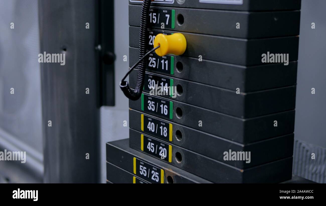 Cable machine outlet weight plates