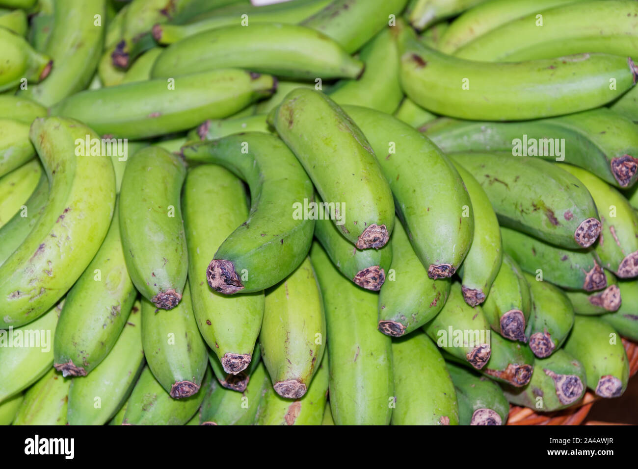 Ripe, green yellow bananas in a basket. Portuguese island of Madeira