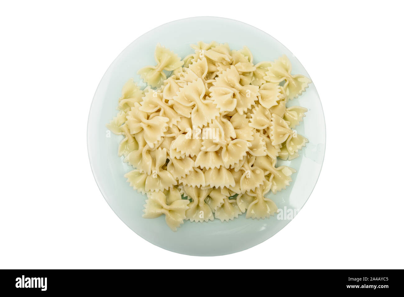 Fresh cooked farfalle pasta, served in dish without sauce isolated on white with clipping path top view Stock Photo