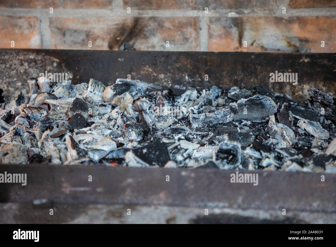 Burning coals in the barbecue ready to cook meat Stock Photo