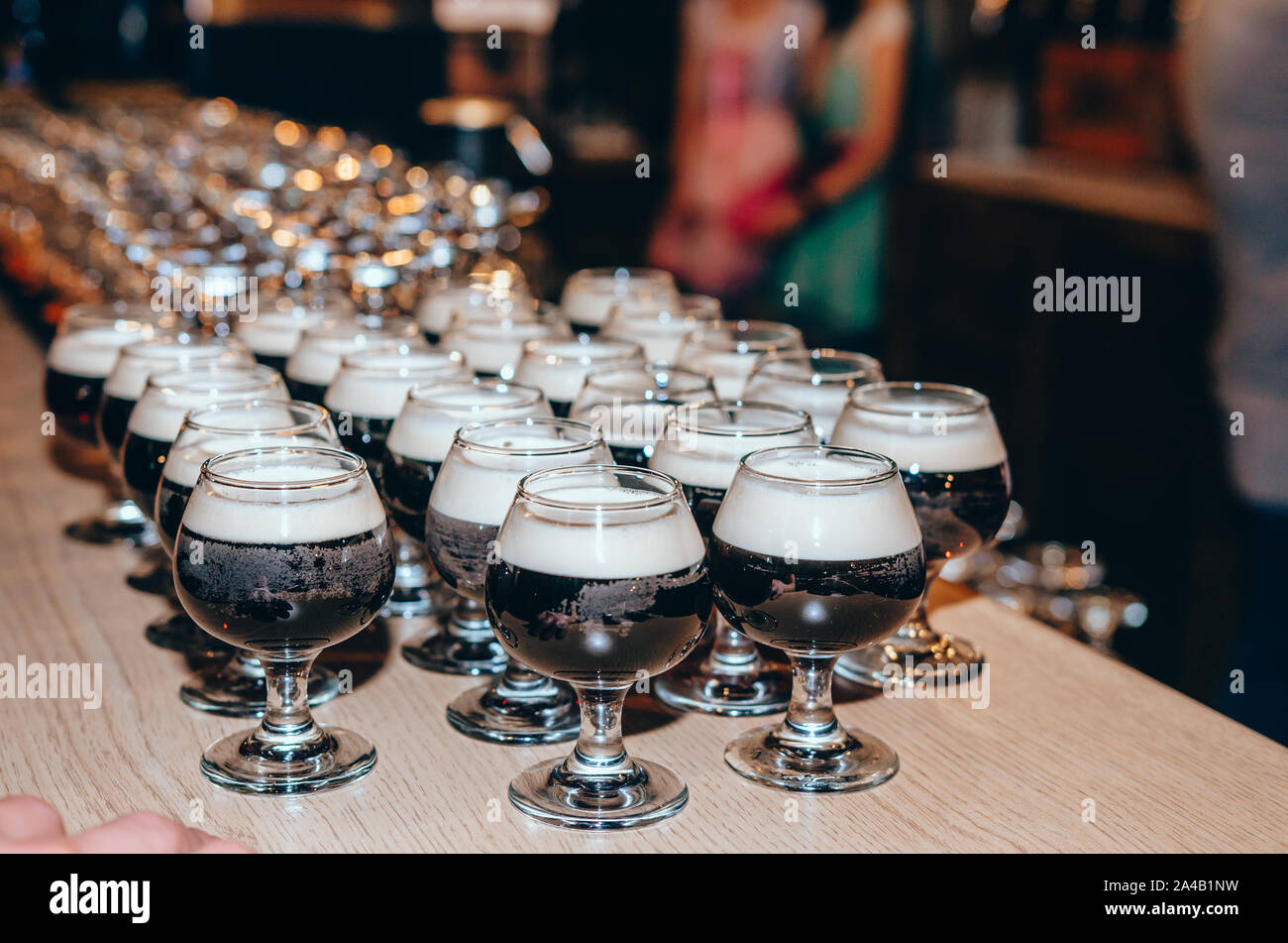 Set of glasses of dark beer in pub or restaurant. Degustation set at the festival Stock Photo