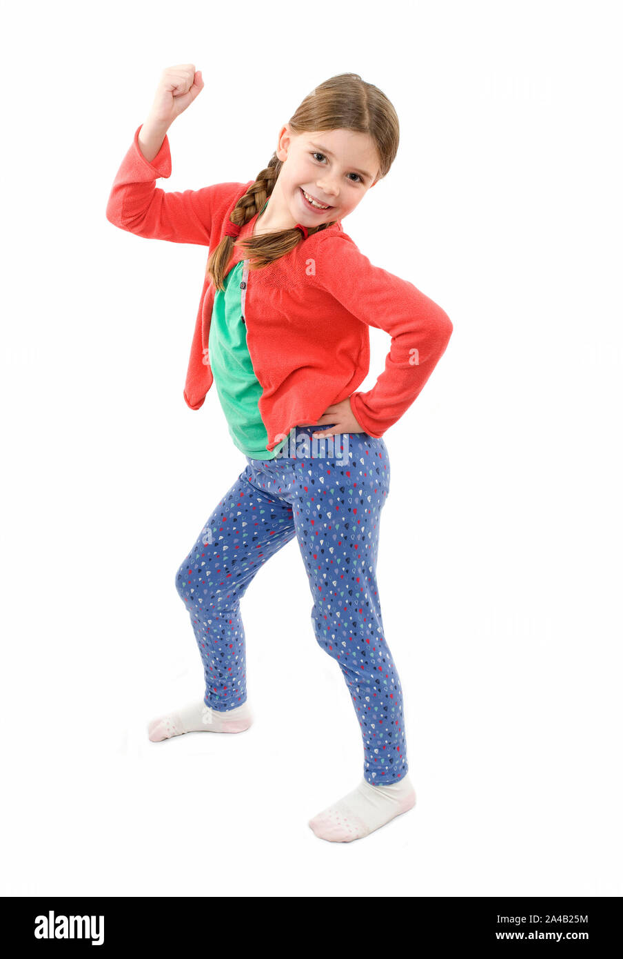 Young girl posing for camera on isolated white background Stock Photo