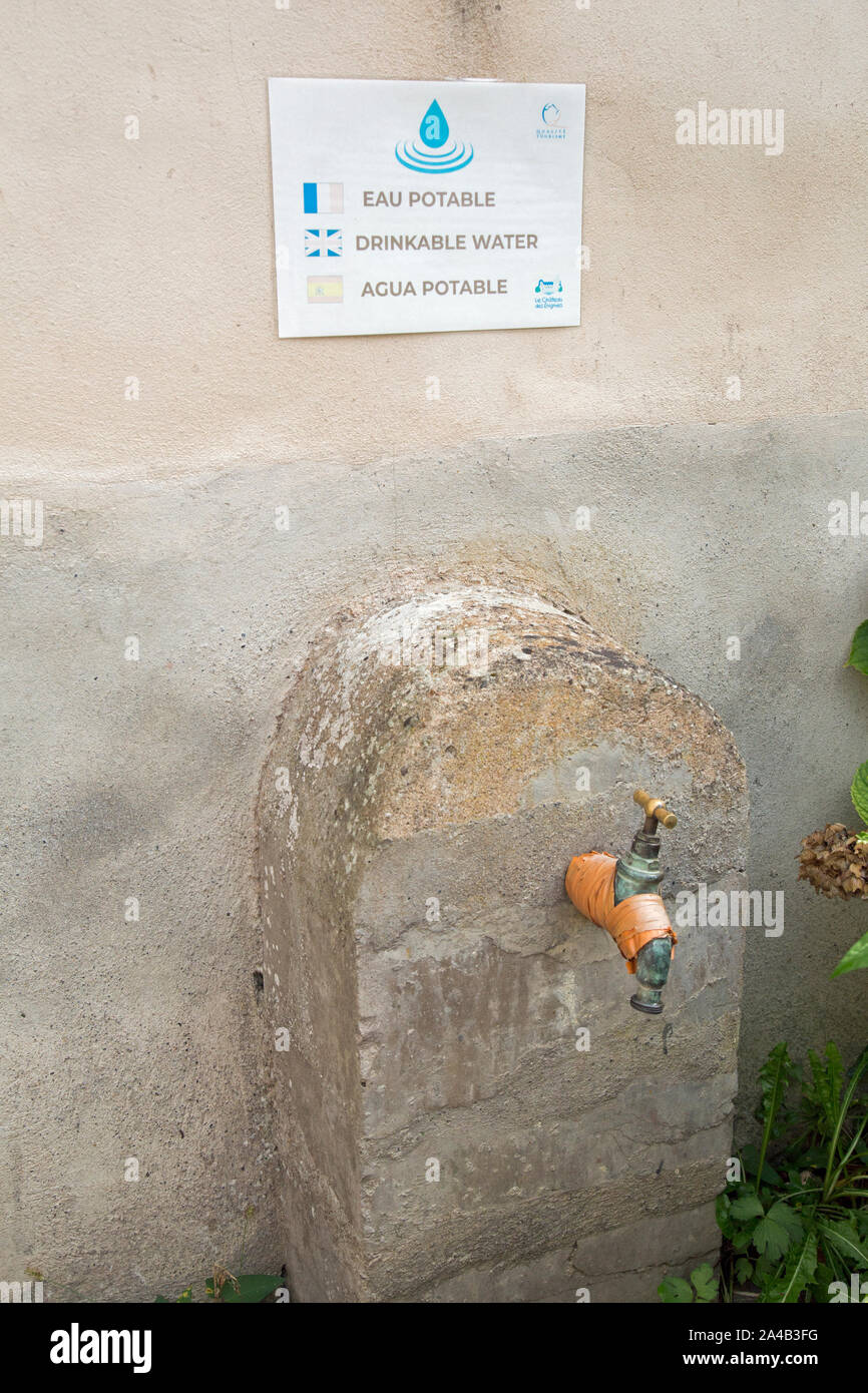 Laas, Aquitaine, France, September 2019, An old tap with a notice proclaiming that the water from it is drinkable. Stock Photo