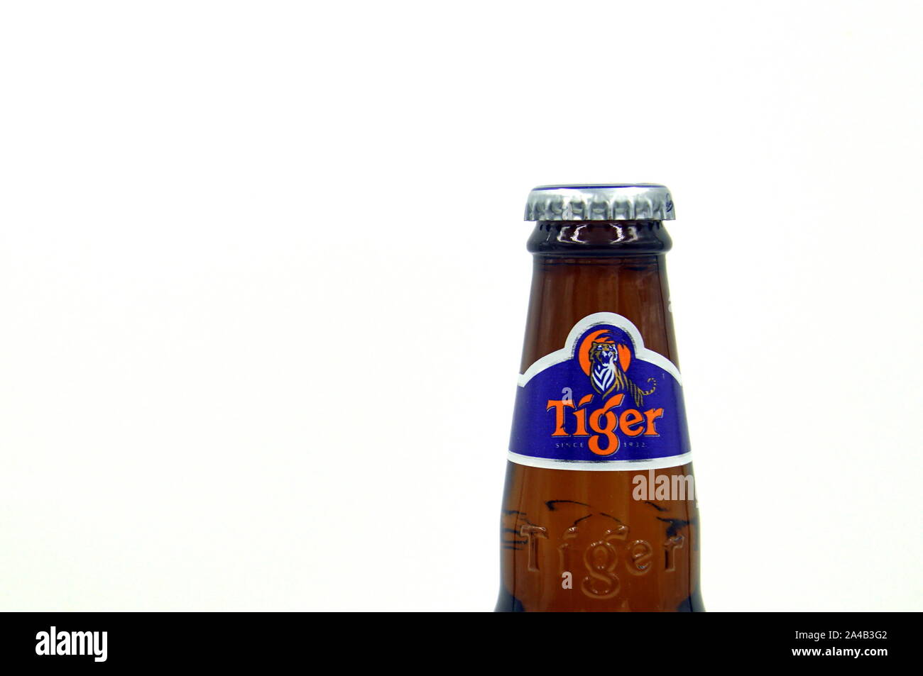 Amsterdam, the Netherland - October 13, 2019: Bottleneck of a Tiger Beer bottle. Stock Photo