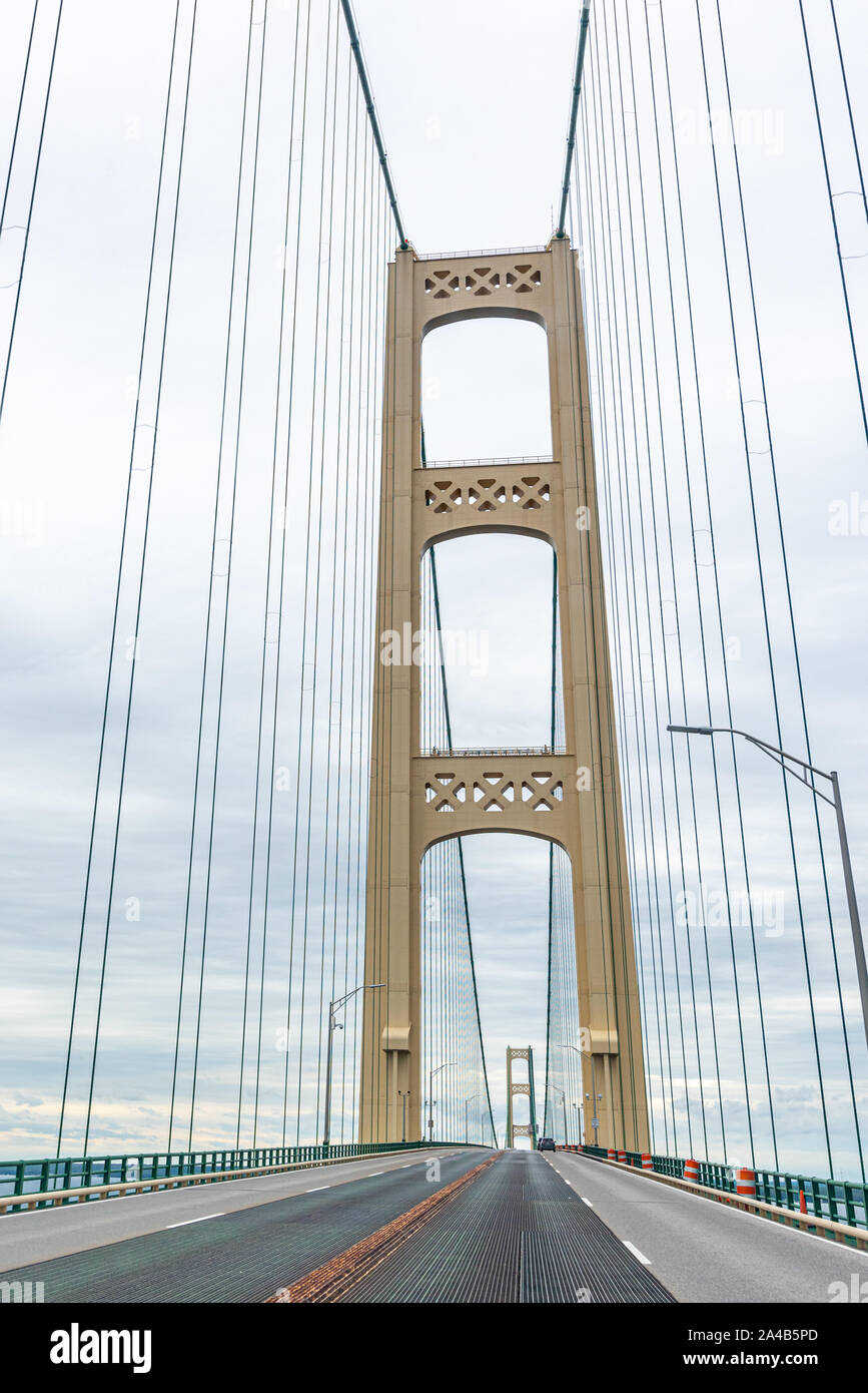 Driving South on the Mackinac Bridge which spans the Straits of Mackinac between the upper and lower peninsulas of Michigan, USA. Stock Photo