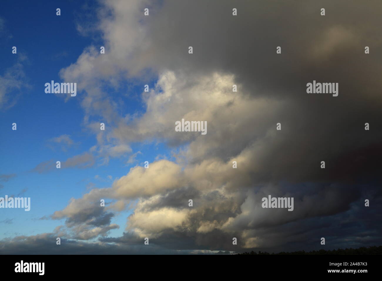 White, grey, dark, clouds, blue sky, meteorology Stock Photo