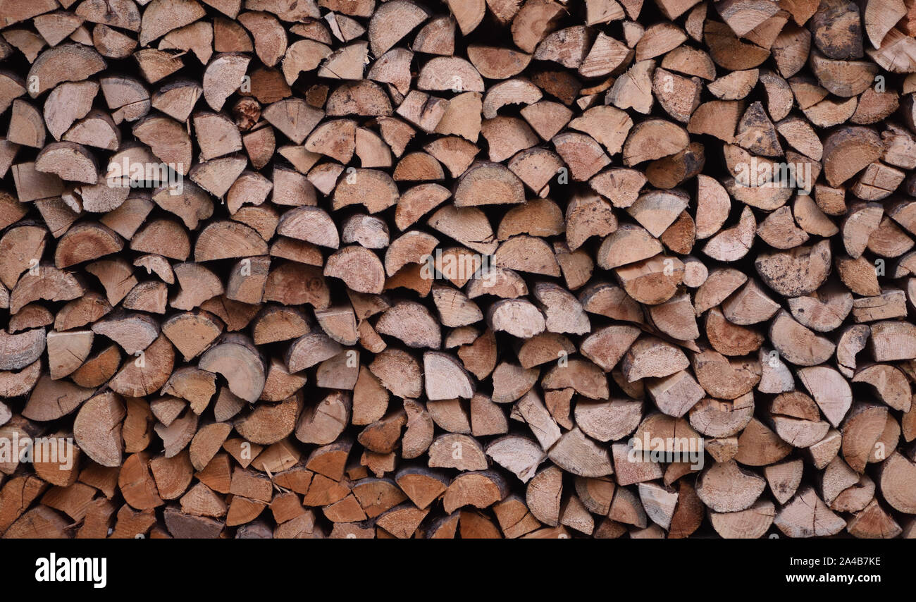 A Stack Of Logs Cut And Split For Firewood Banff Alberta Canada