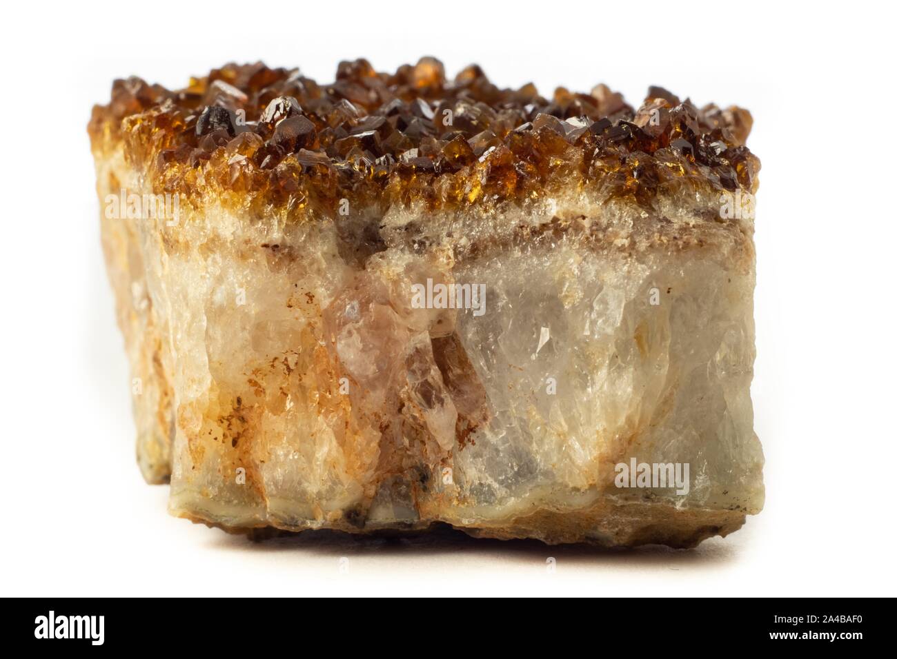 Block of natural citrine quartz mineral from Brazil isolated on a pure white background Stock Photo