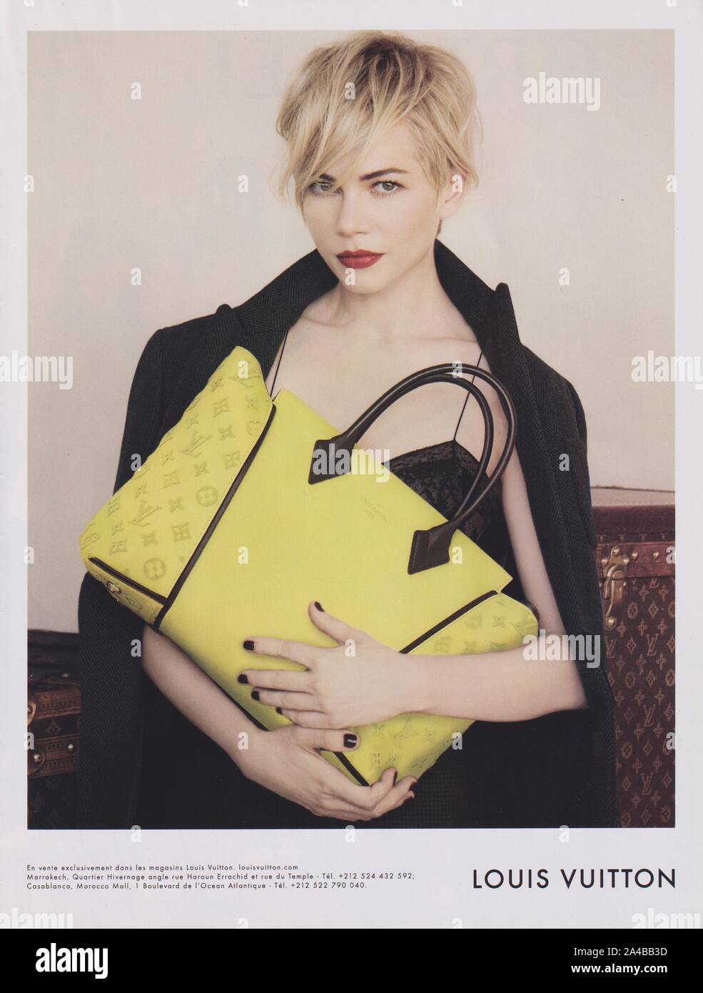 poster advertising Louis Vuitton handbag with Michelle Williams actress in  paper magazine from 2014, advertisement, creative advert from 2010s Stock  Photo - Alamy