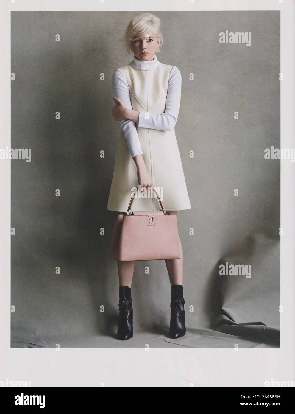 poster advertising Louis Vuitton handbag with Michelle Williams actress in  paper magazine from 2015, advertisement, creative advert from 2010s Stock  Photo - Alamy