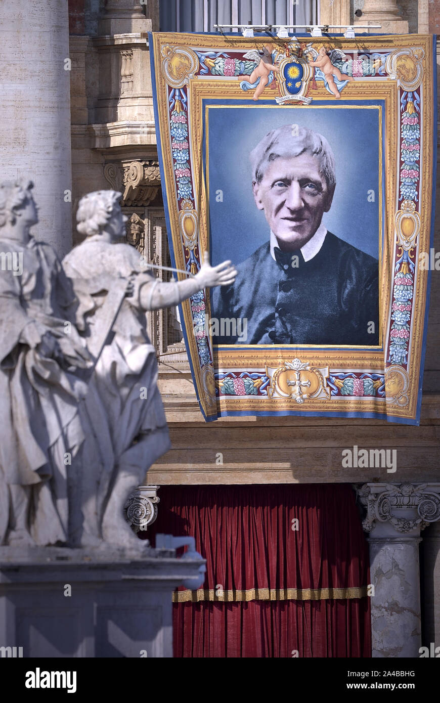 Vatican City, Vatican City. 13th Oct, 2019. Tapestry portraying Cardinal John Henry Newman hangs from the façade of St. Peter's Basilica as Pope Francis celebrates Canonization Mass for Britain John Henry Newman, Italian Giuseppina Vannini, Indian Maria Teresa Chiramel Mankidiyan, Brazilian Dulce Lopes Pontes, and Swiss Margarita Bays on Sunday, October 13, 2019, in Saint Peter's Square at the Vatican. Photo by Sefano Spaziani/UPI Credit: UPI/Alamy Live News Stock Photo