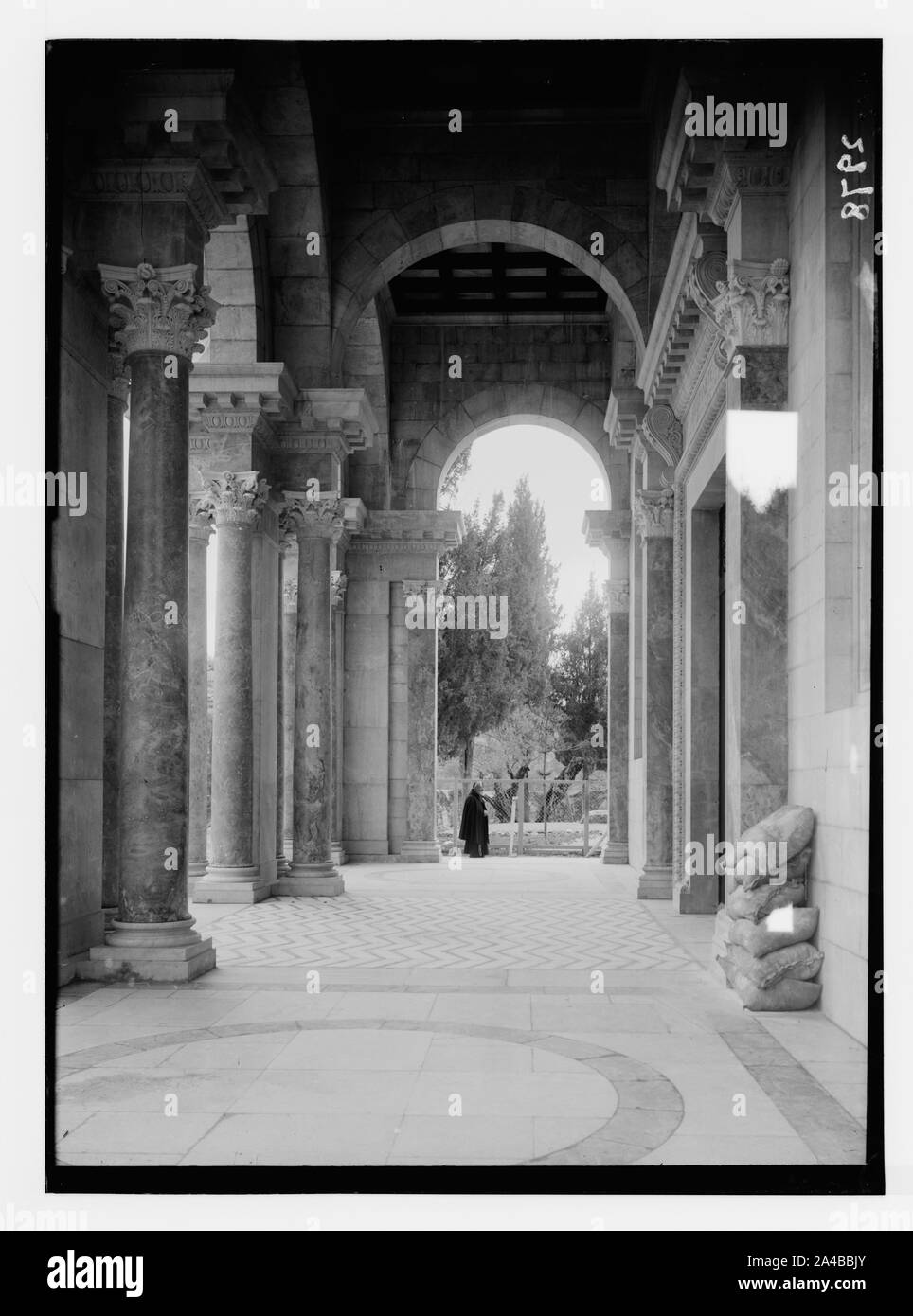 The Basilica of Gethsemane [i.e., Church of All Nations or Church of the Agony]. The portico, looking into the garden. Stock Photo