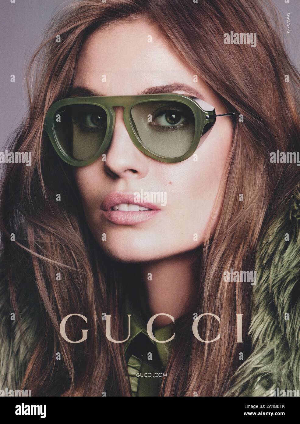 poster advertising GUCCI fashion with Nadja in magazine from 2014 year, creative GUCCI advert from 2010s Stock Photo - Alamy
