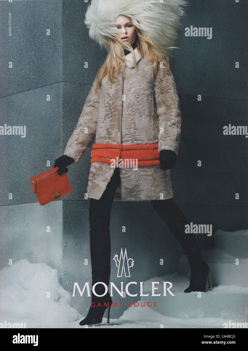 poster advertising Moncler in paper magazine from 2014, advertisement,  creative Moncler advert from 2010s Stock Photo - Alamy