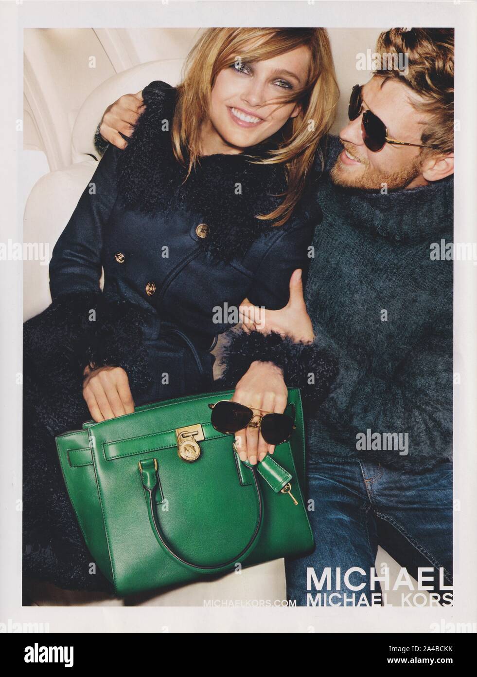 poster advertising Michael Kors fashion house with Karmen Pedaru in paper  magazine from 2014 year, advertisement, creative Michael Kors 2010s advert  Stock Photo - Alamy