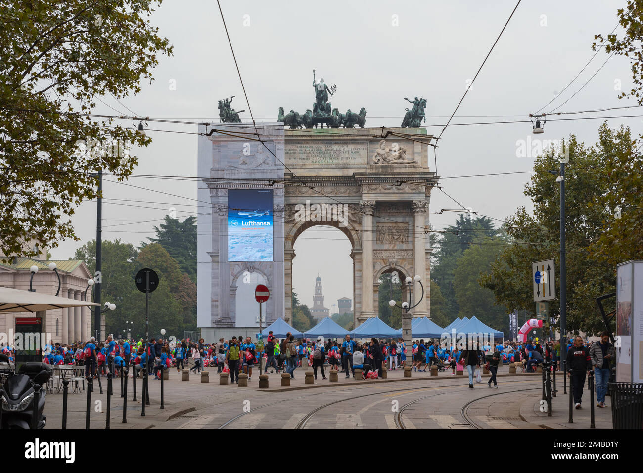 MILAN, ITALY - OCTOBER 13 2019: Athletes celebrate the end of the Deejay Ten at the Arco della Pace, a running event organized by Deejay Radio for the Stock Photo