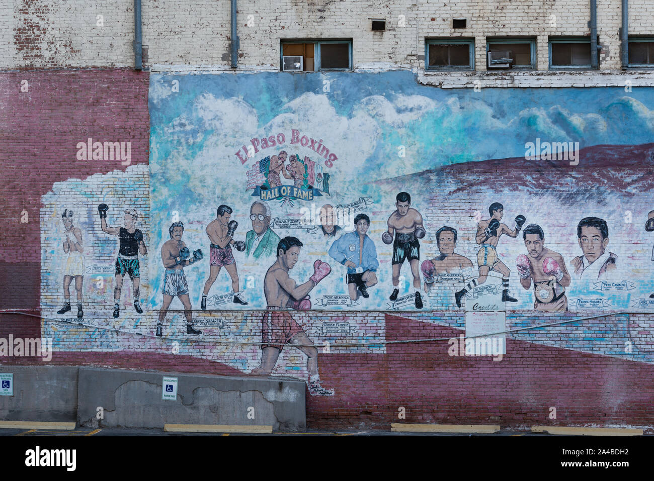 Wall Mural Young man boxing training , on top of the house above the city 