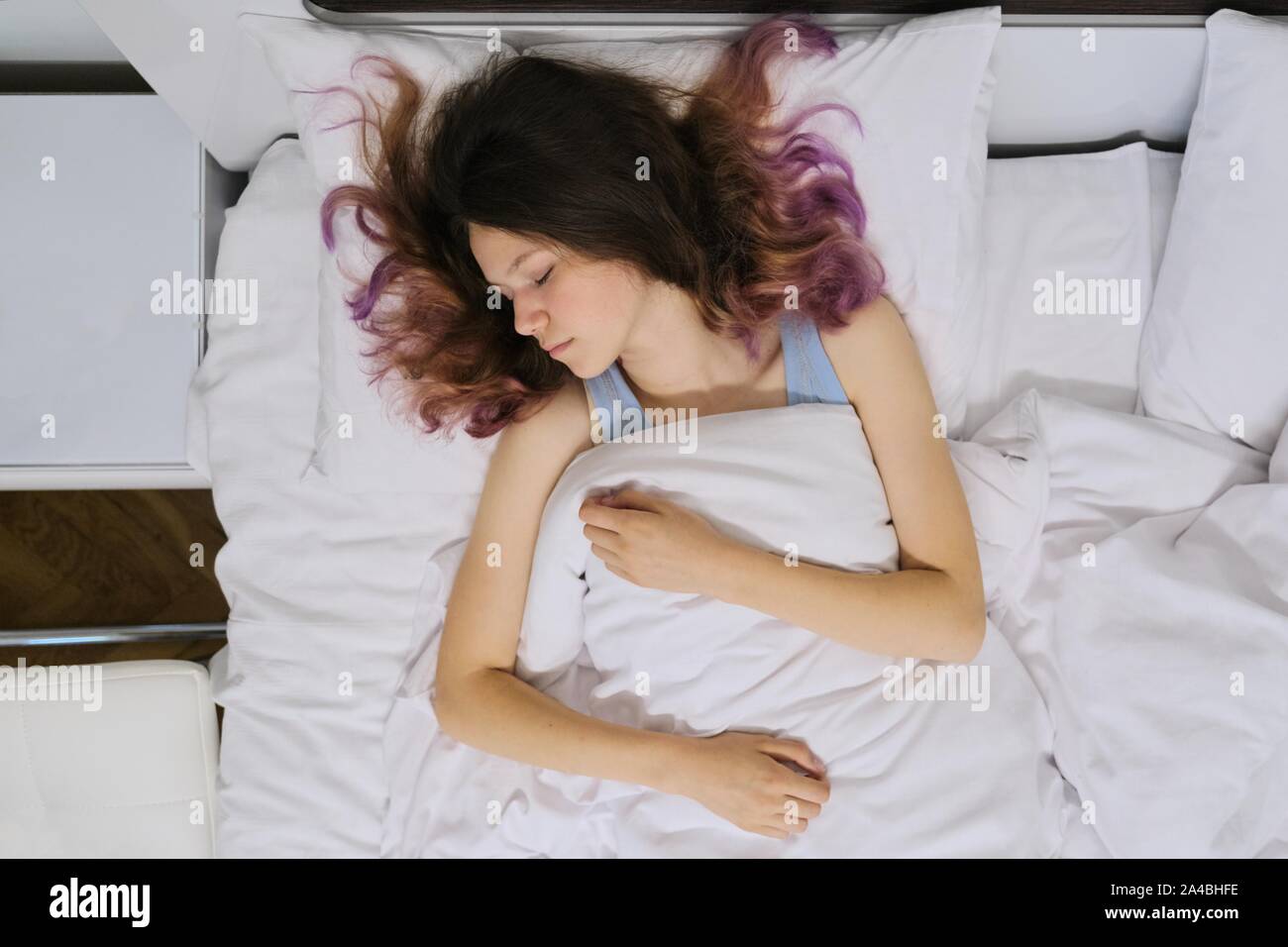Teen in bed asleep from above hires stock photography and images Alamy
