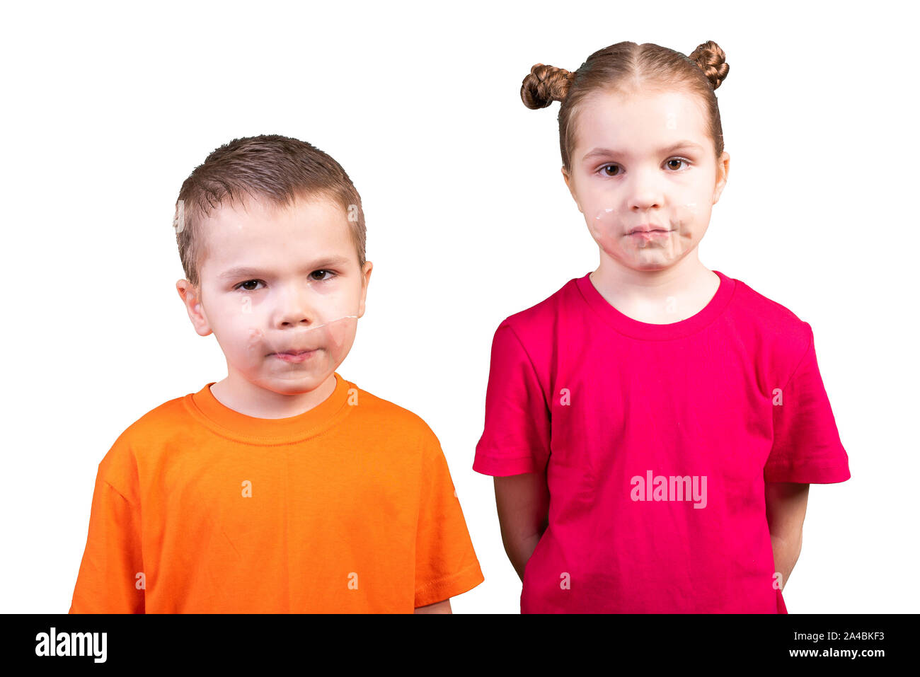 Boy and girl with mouths sealed. Isolated on a white background. Stock Photo