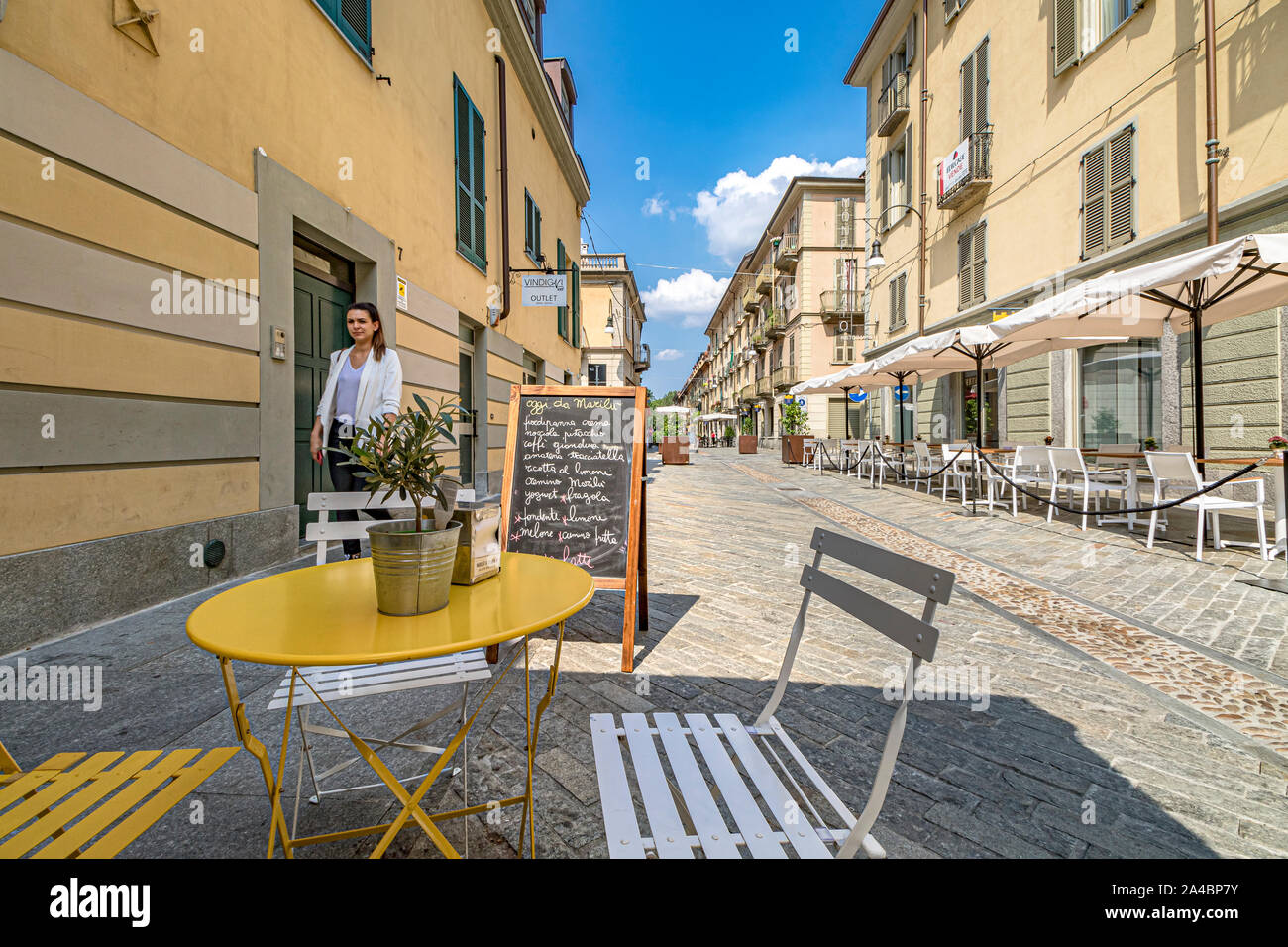 Tables and chairs outside a gelateria on Via Monferrato ,Turin,Italy Stock Photo