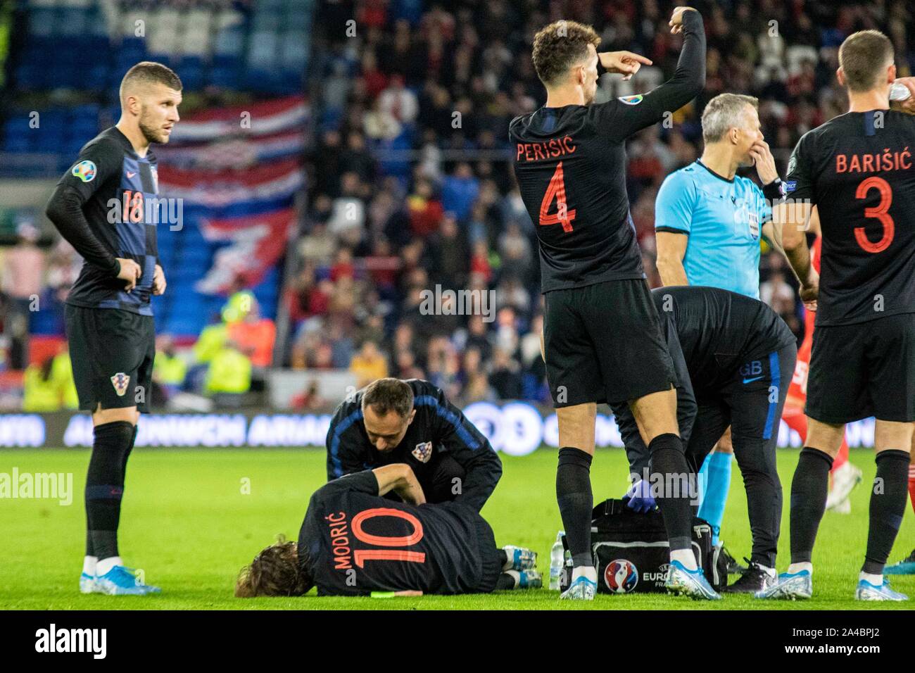 Cardiff, Wales 13/10/19. Luka Modric down injured against Wales. Wales ...