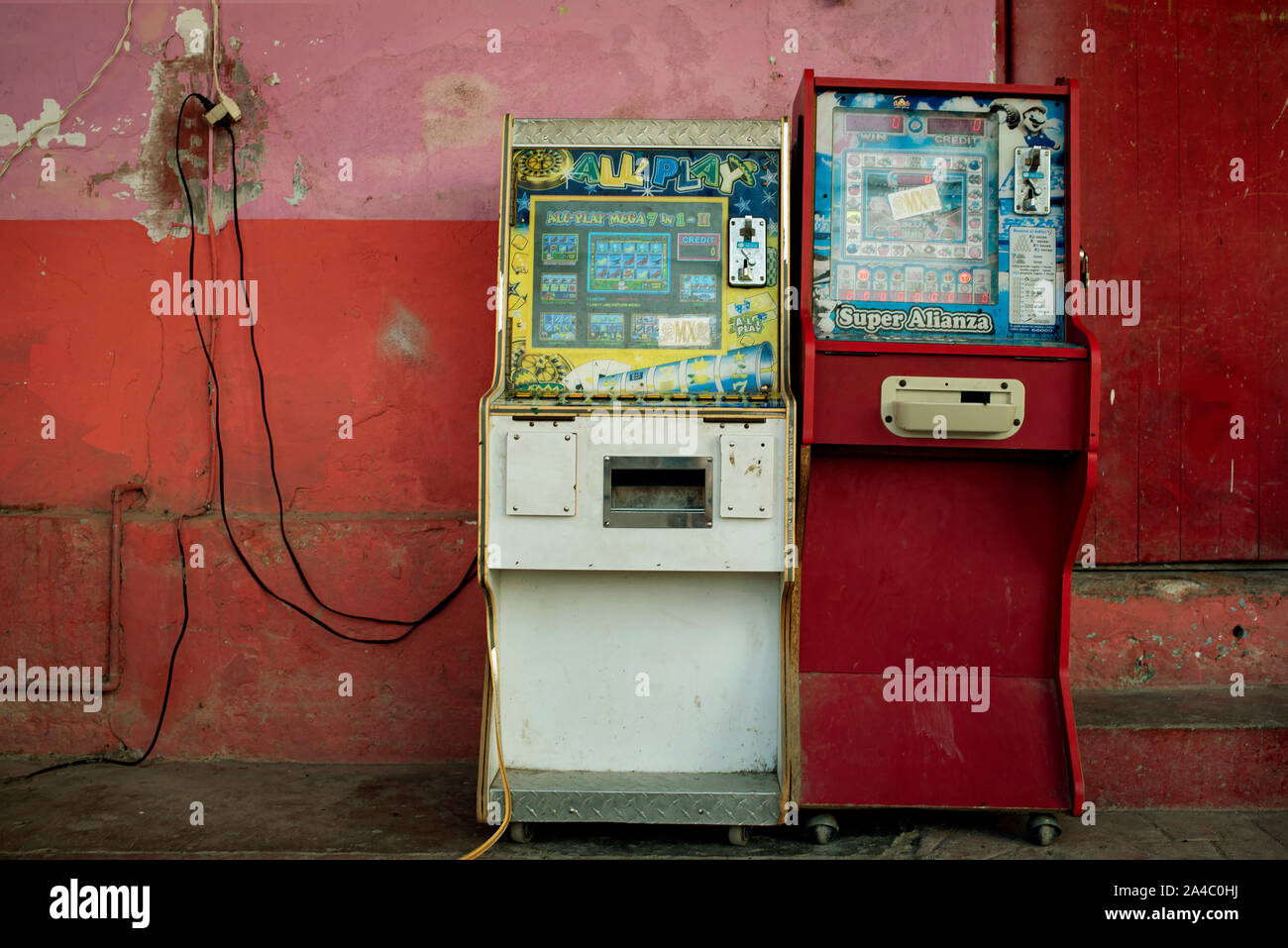 Super Alianza coin operated, or slot machines with electro mechanical arcade games - they are still in use in Mexcaltitán, Nayarit, Mexico. Jul 2019 Stock Photo