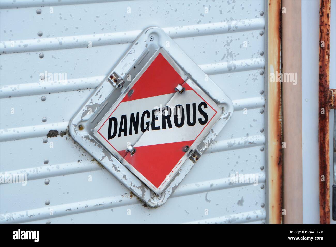 Truck contents identification placard in red for highway use when loaded and carrying dangerous and explosive materials on public roads in the USA Stock Photo