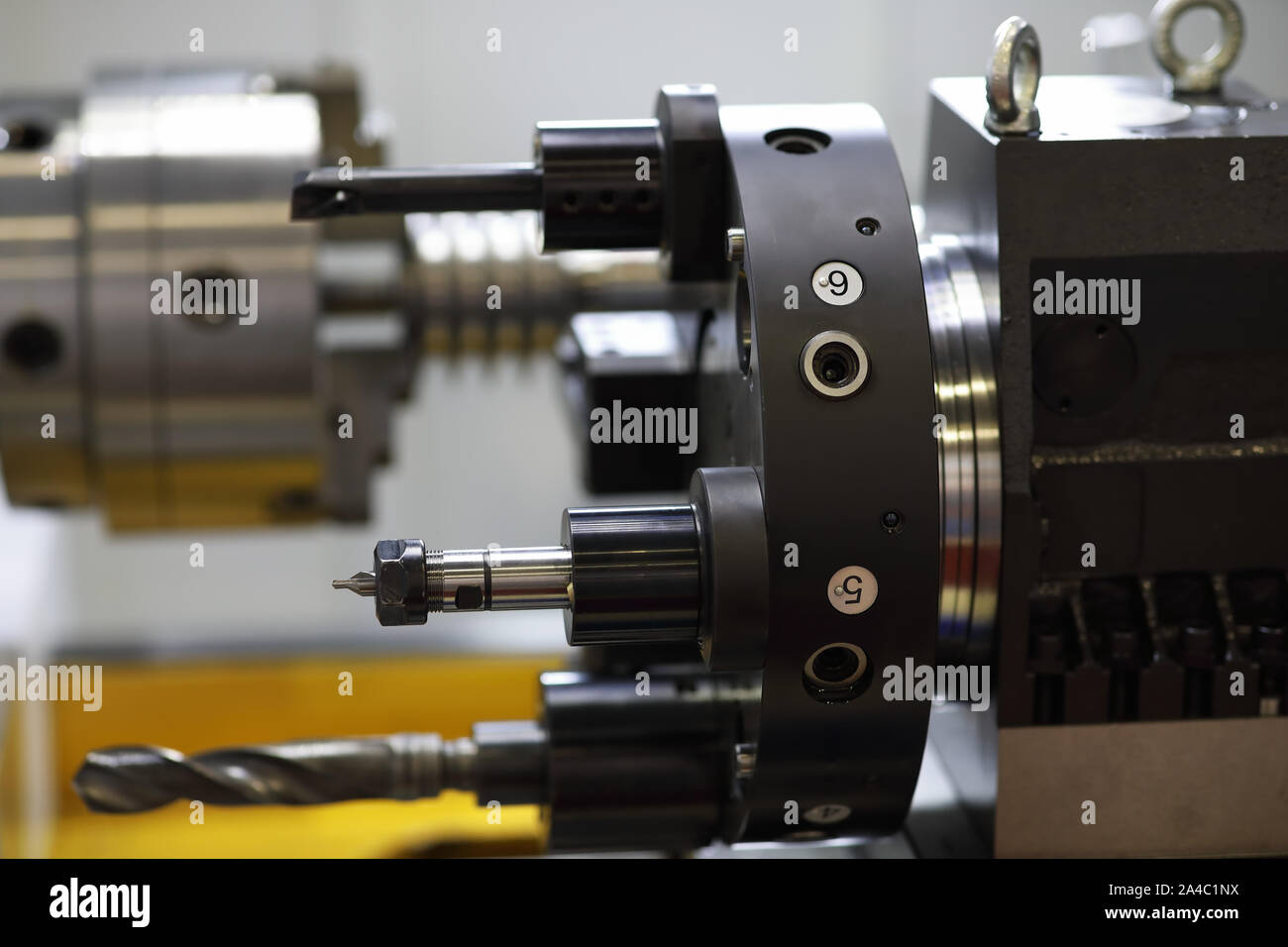 CNC lathe machine with tool turret disk on which mounted all the tools ...