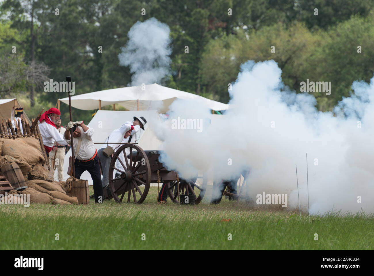 The Mexican artillery goes into action at the annual Battle of San Jacinto Festival and Battle Reenactment, a living- history retelling and demonstration of the historic Battle of San Jacinto in La Porte, Texas Stock Photo