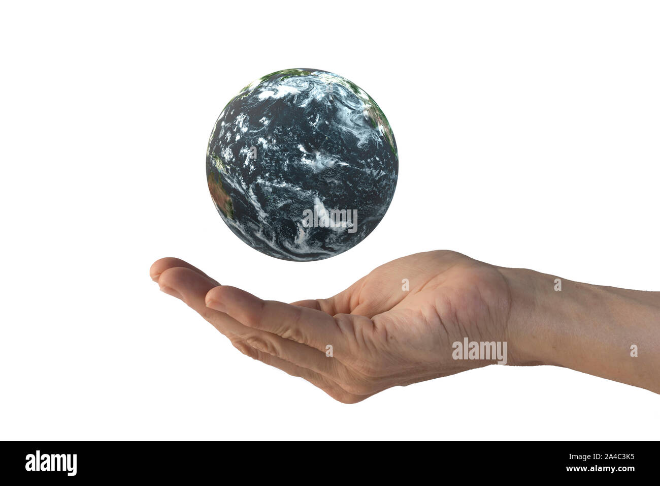 Planet Earth floating on human hand, isolated on a white background Stock Photo