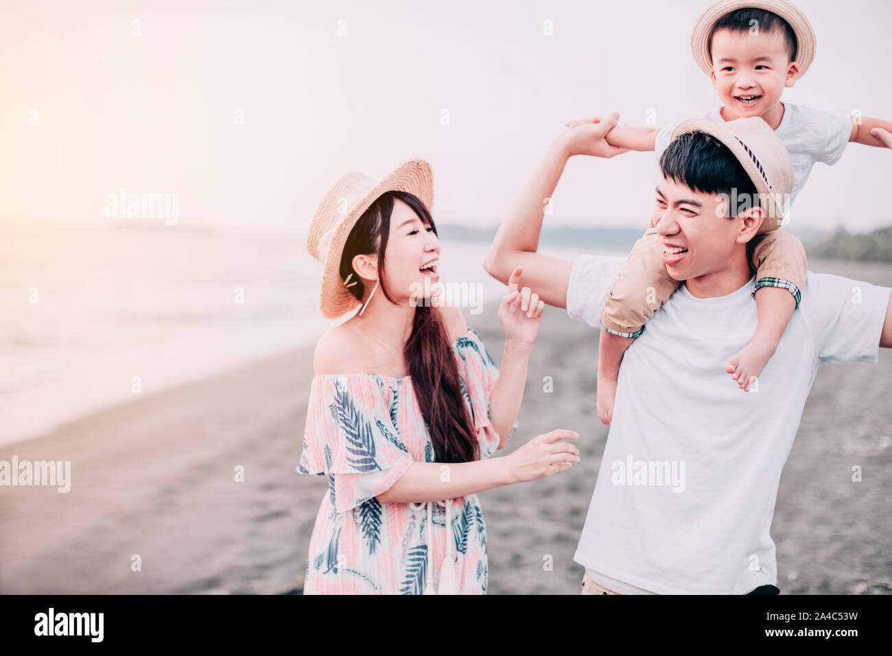 Asian family at the beach hi-res stock photography and images - Alamy