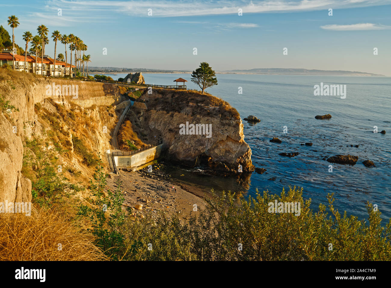 Pismo Beach Cliffs and Shore Cliffs Hotel at sunset, California Coastline Stock Photo