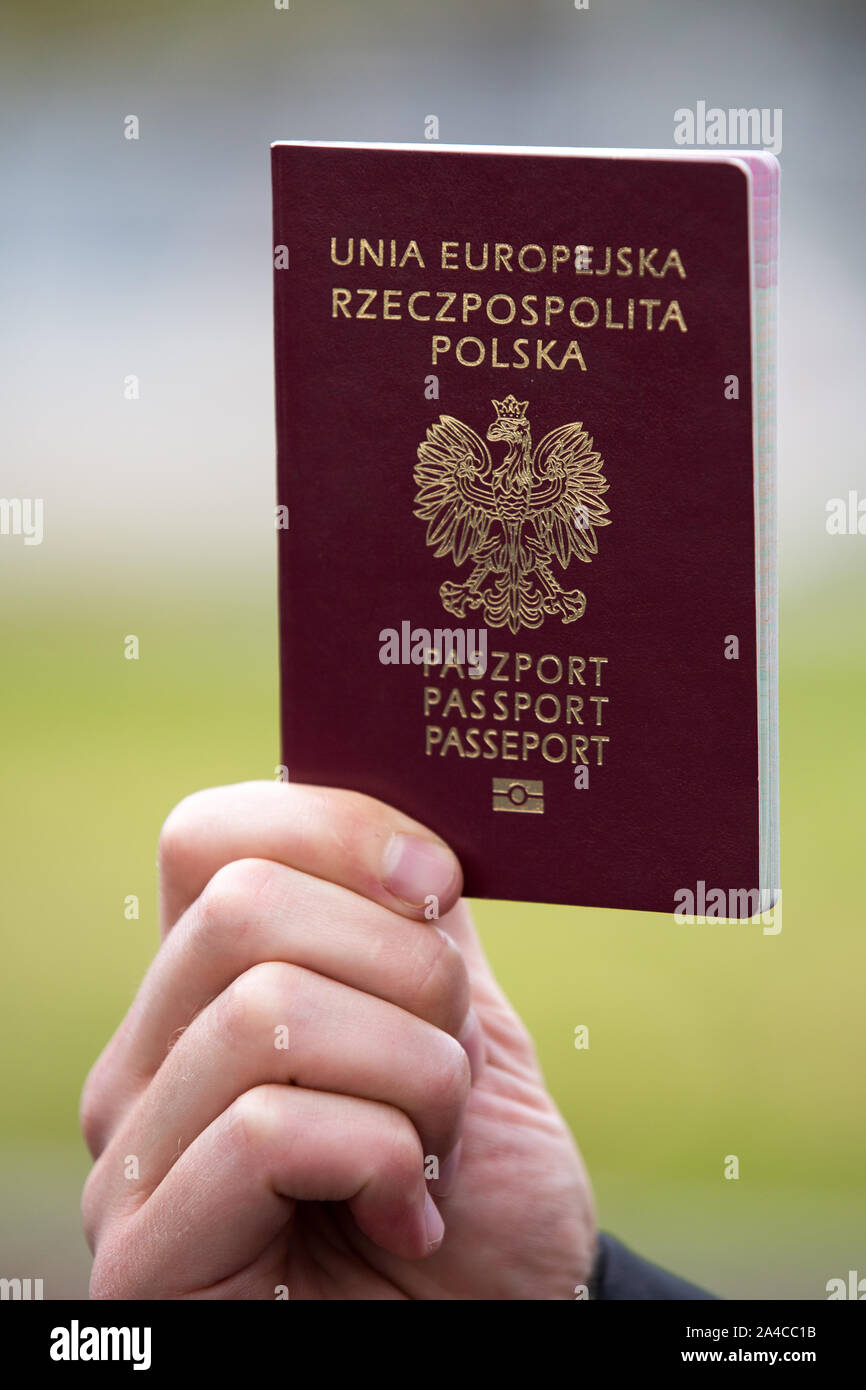 Gothenburg, Sweden. 13th Oct, 2019. A view of a Polish passport held in hand in front of the Polonia Center building. An identity document is necessary to have the right to vote in elections.Citizens and residents of Sweden who emigrated from Poland vote in 2019 Polish parliamentary elections in Gothenburg, Sweden. Credit: SOPA Images Limited/Alamy Live News Stock Photo