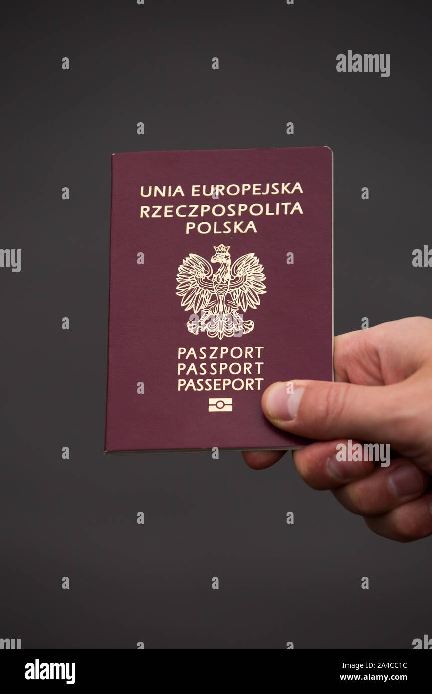 Gothenburg, Sweden. 13th Oct, 2019. A view of a Polish passport held in hand in front of the Polonia Center building. An identity document is necessary to have the right to vote in elections.Citizens and residents of Sweden who emigrated from Poland vote in 2019 Polish parliamentary elections in Gothenburg, Sweden. Credit: SOPA Images Limited/Alamy Live News Stock Photo