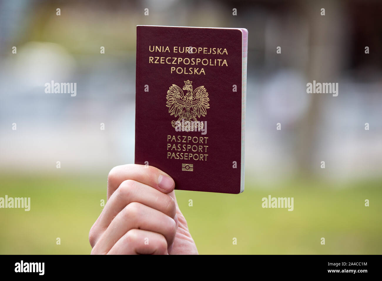 Gothenburg, Sweden. 13th Oct, 2019. A view of a Polish passport held in hand in front of the Polonia Center building. An identity document is necessary to have the right to vote in elections.Citizens and residents of Sweden who emigrated from Poland vote in 2019 Polish parliamentary elections in Gothenburg, Sweden. Credit: SOPA Images Limited/Alamy Live News Stock Photo