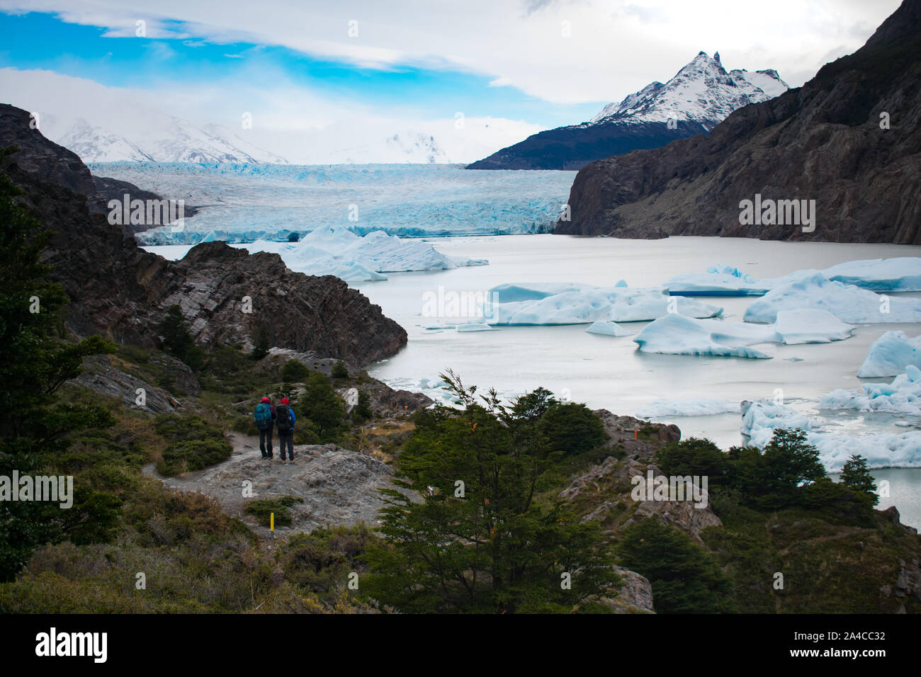 Glacier Grey, Torres del Paine National Park, Chile. Hikers looking out on glaicer field Stock Photo