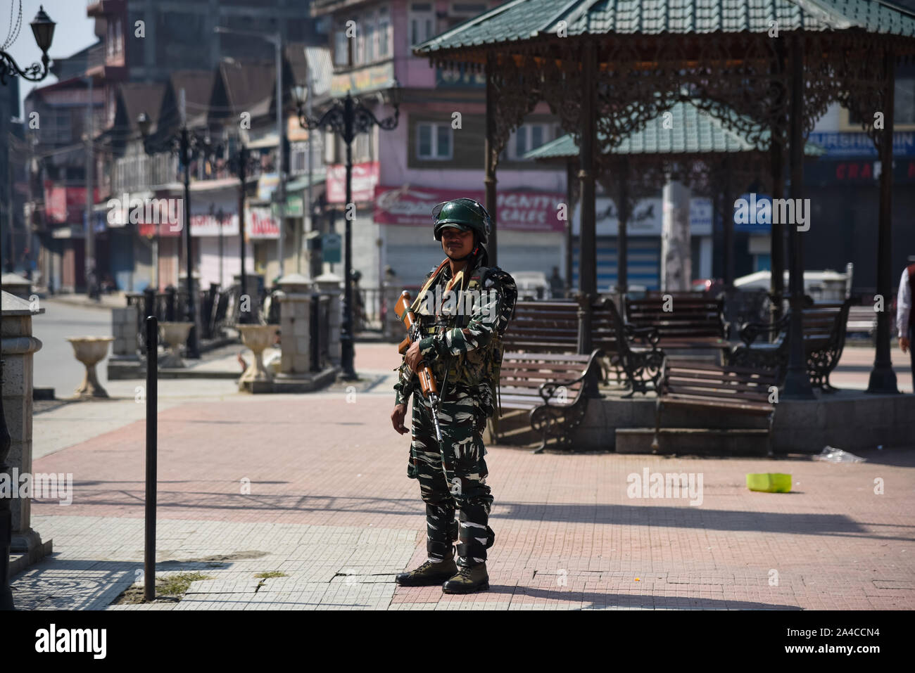 Srinagar, India. 11th Oct, 2019. A para military trooper stands guard during the demonstration.After Friday prayers hundreds of people took part in a demonstration in the Soura neighborhood. Tensions have been escalating since the Indian government removed the region's partial autonomy three weeks ago. Information has also been scarce, as internet and mobile networks have been blocked. Credit: SOPA Images Limited/Alamy Live News Stock Photo