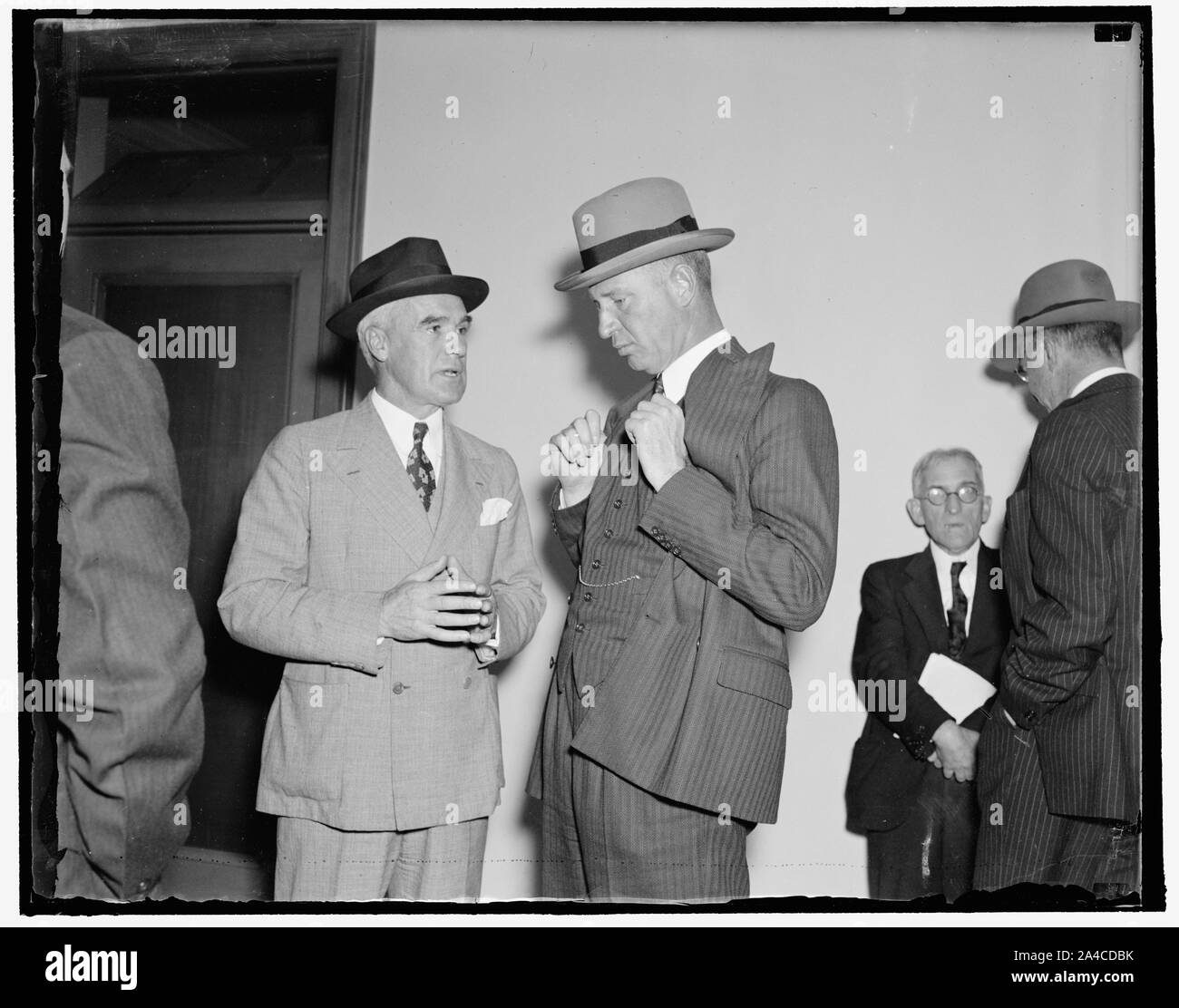 The Winners! Washington, D.C., Sept. 15. Capt. Roger Williams, (left) Vice President of the Newport News Shipbuilding and Dry Dock Co., whose bid of $17,500,000 for the construction of the proposed new vessel to replace the Leviathan in the North Atlantic, was found to be t lowest when the bids were opened by the U.S. Maritime Commission today. John M. Franklin (right), President of the U.S. Lines which will operate the new liner. When completed the new vessel will be a twin screw, combination mail, passenger and cargo carrier, and will give the American Merchant Fleet the safest vessel afloat Stock Photo